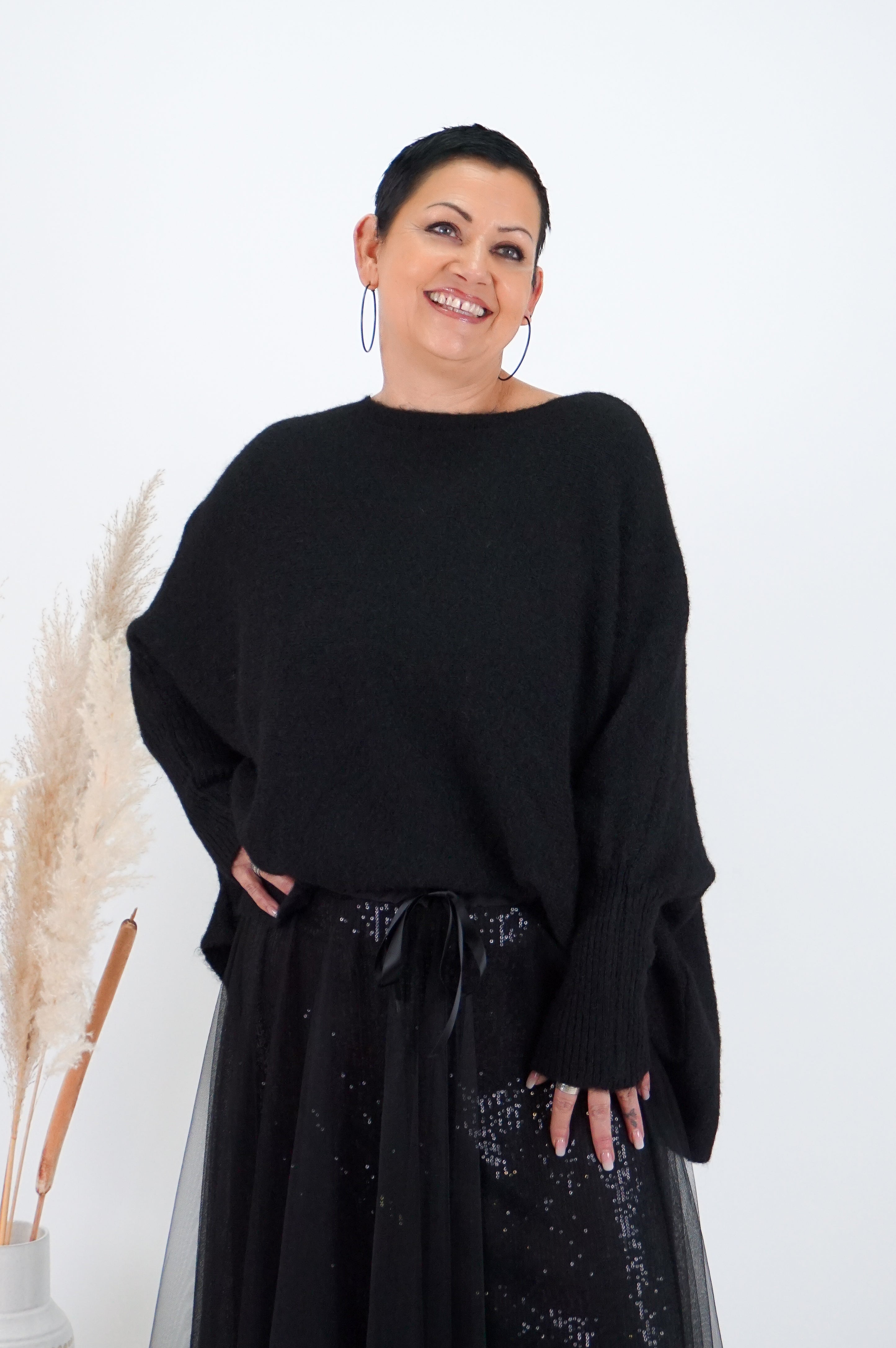 Weiter Strickpulli, schwarz