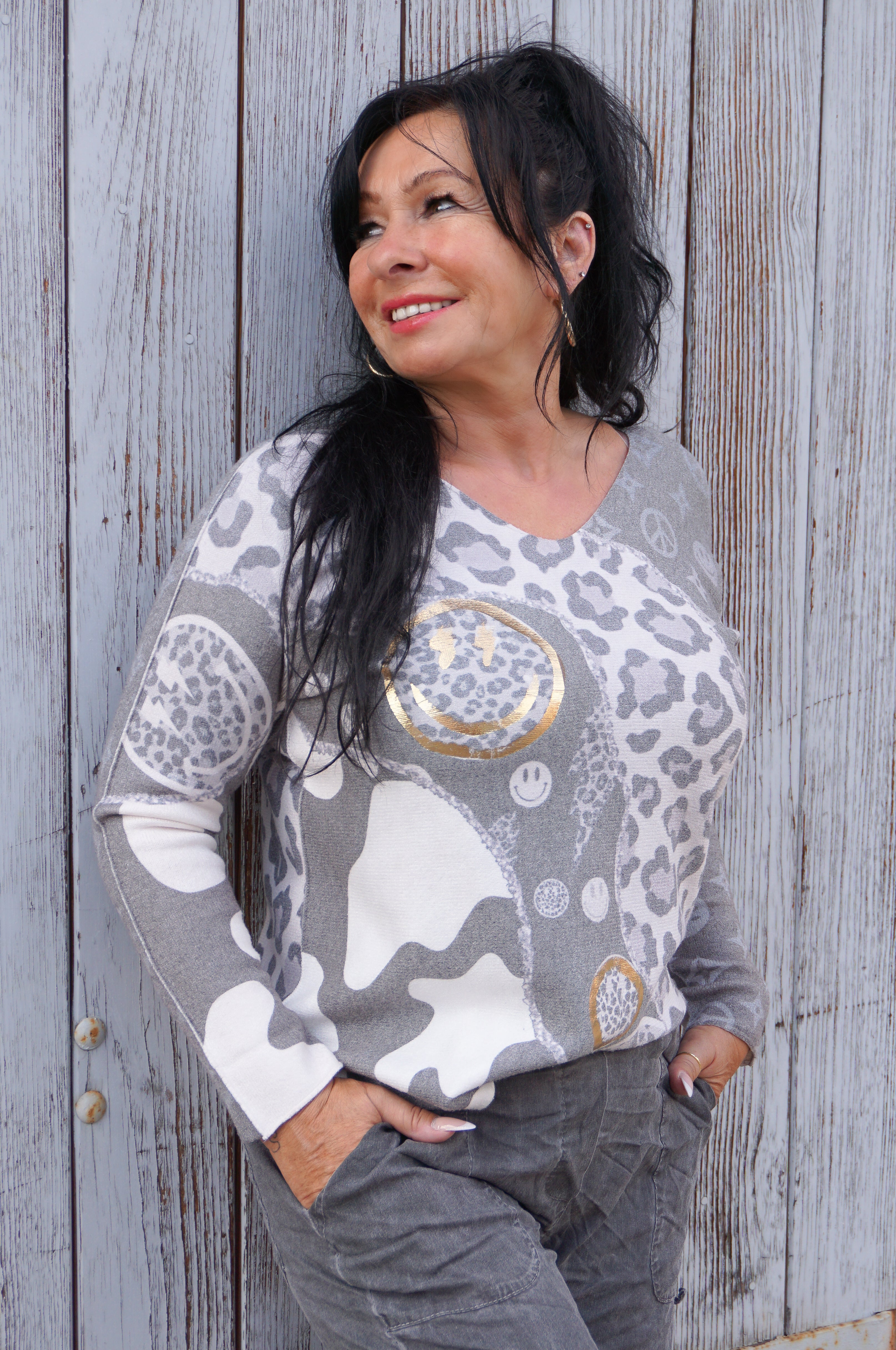 Verspielter Feinstrickpulli