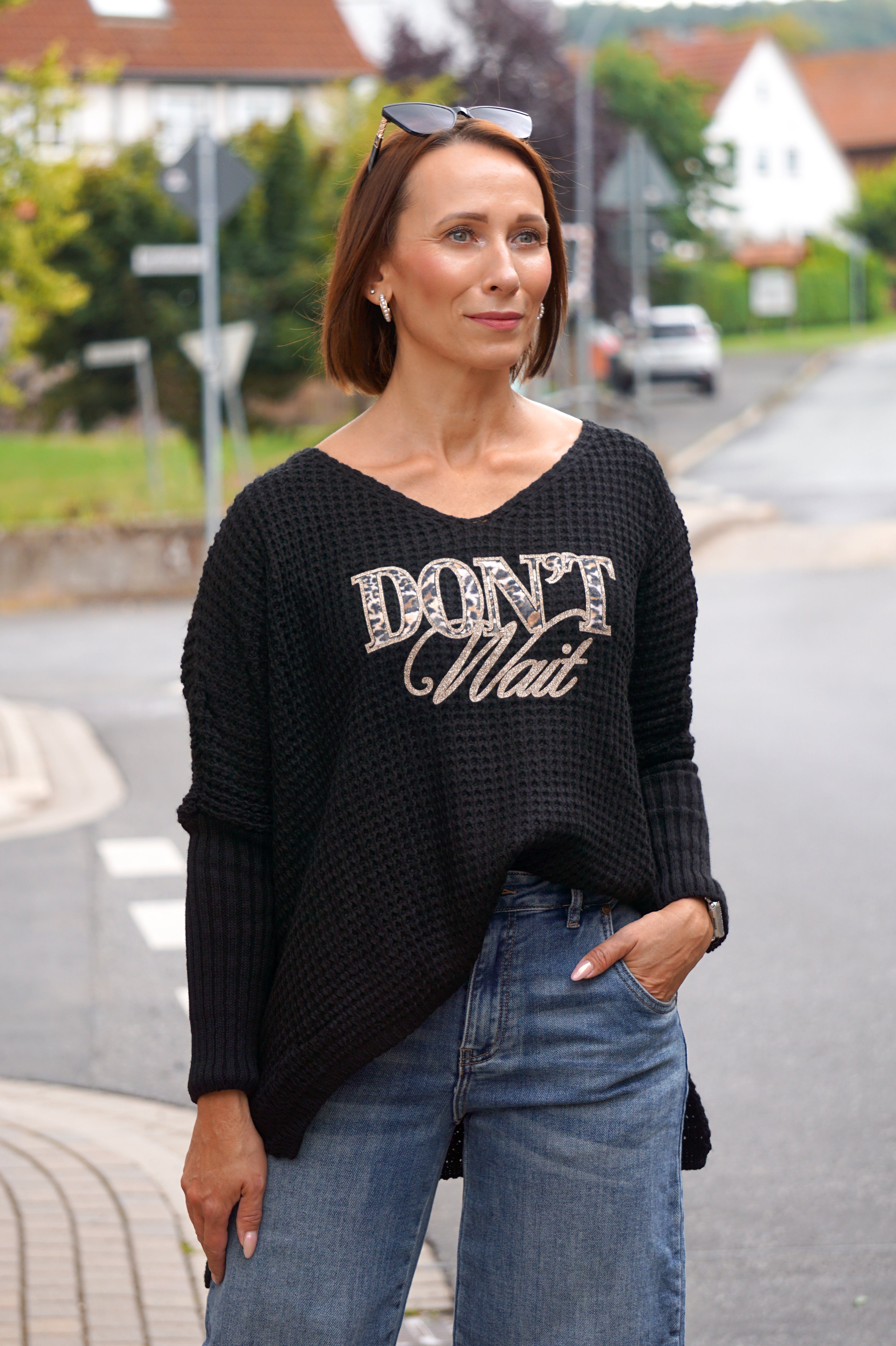 Strickpulli "don’t wait", schwarz