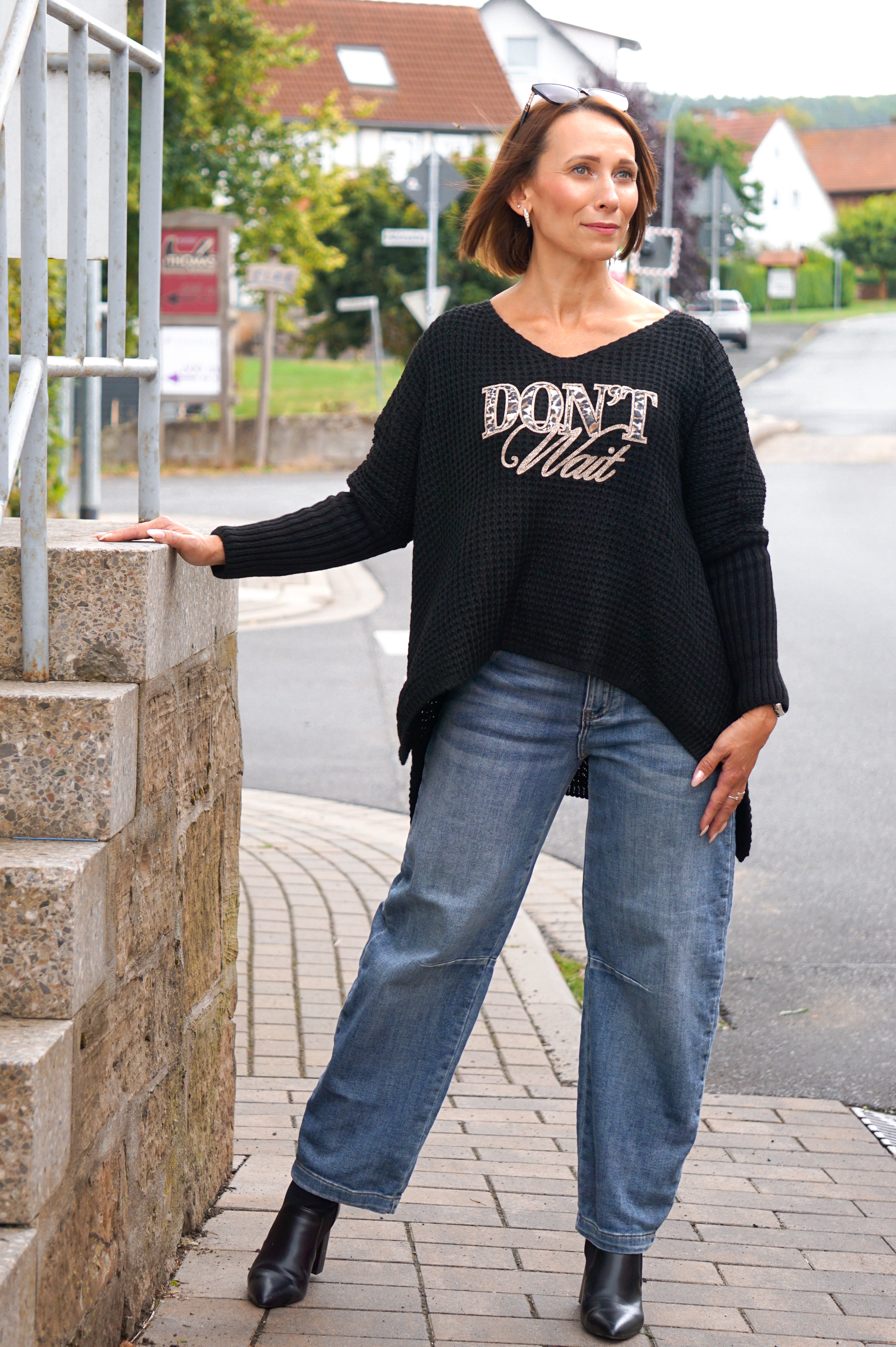 Strickpulli "don’t wait", schwarz