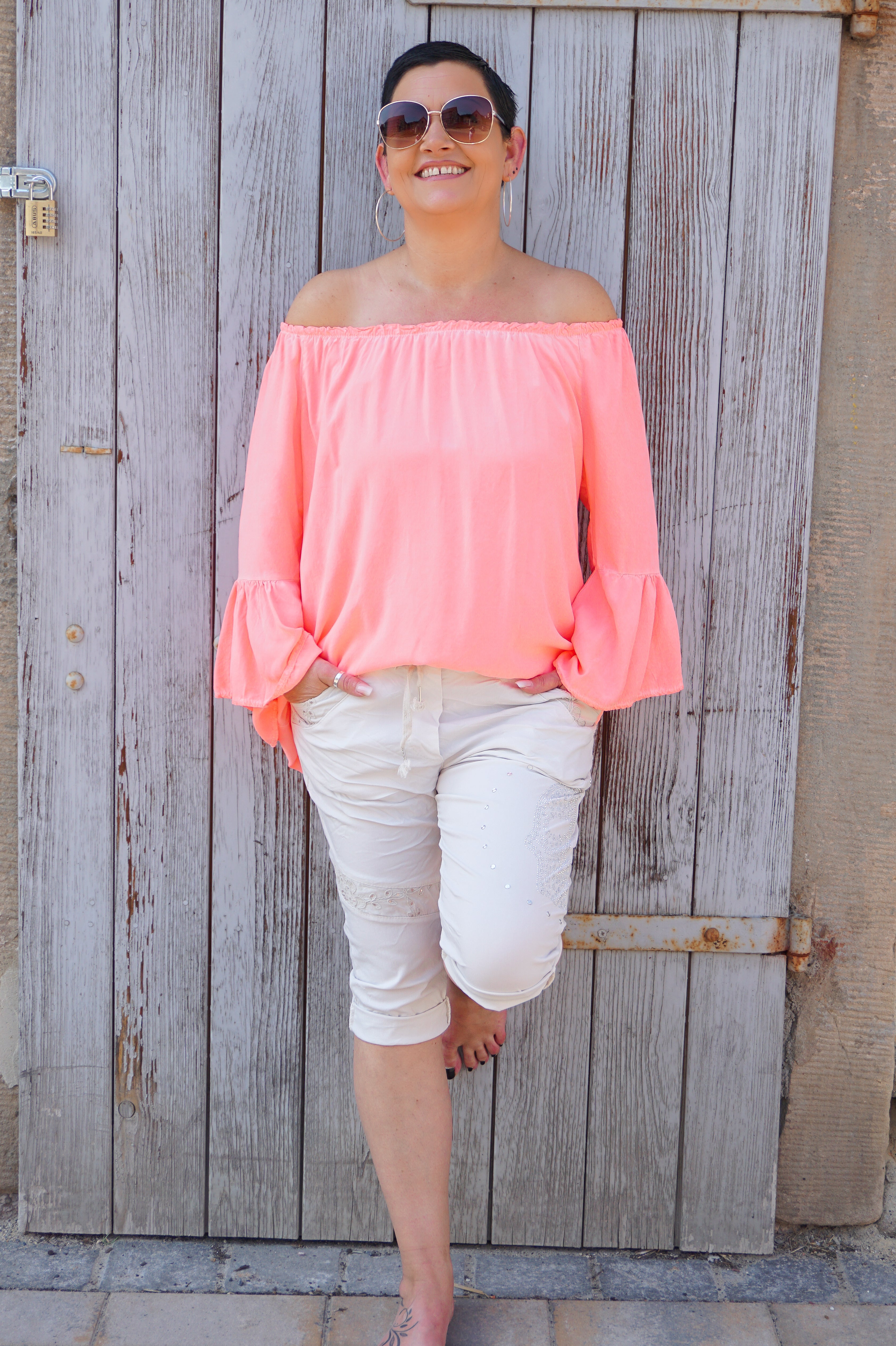 Bluse in neon koralle