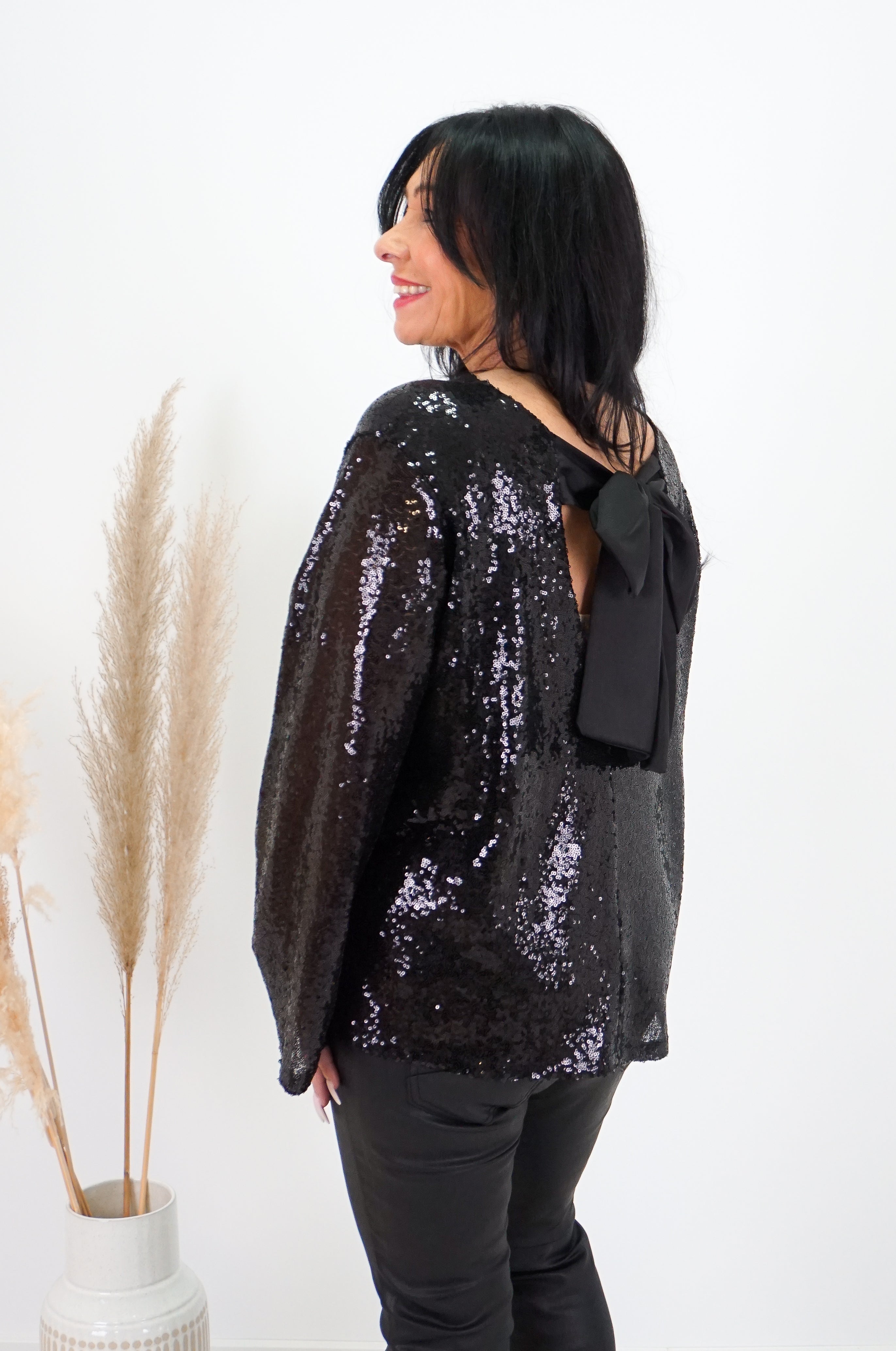 Bluse mit Pailletten und Schleife, schwarz
