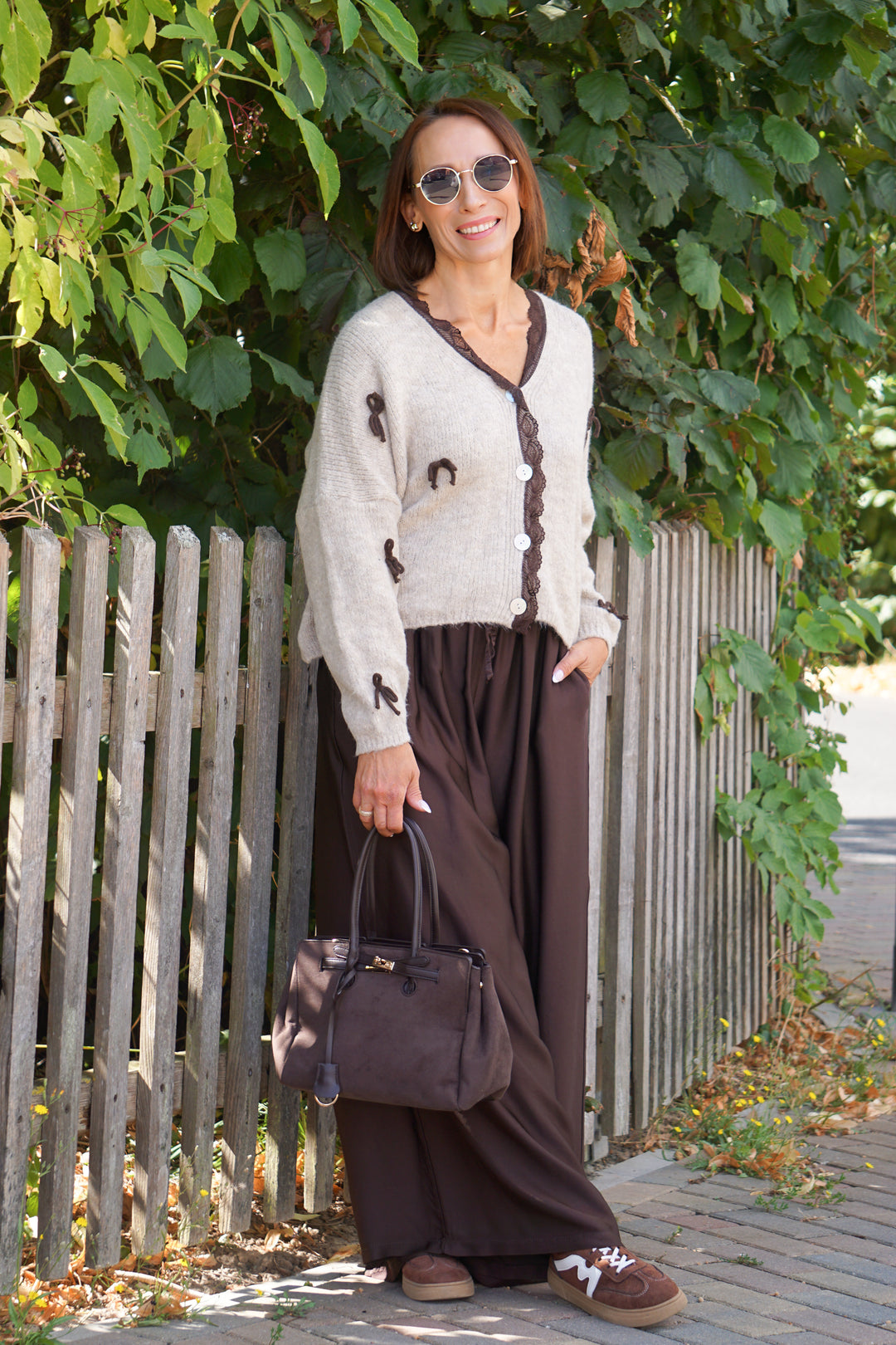 Strickjacke mit Schleifen, beige