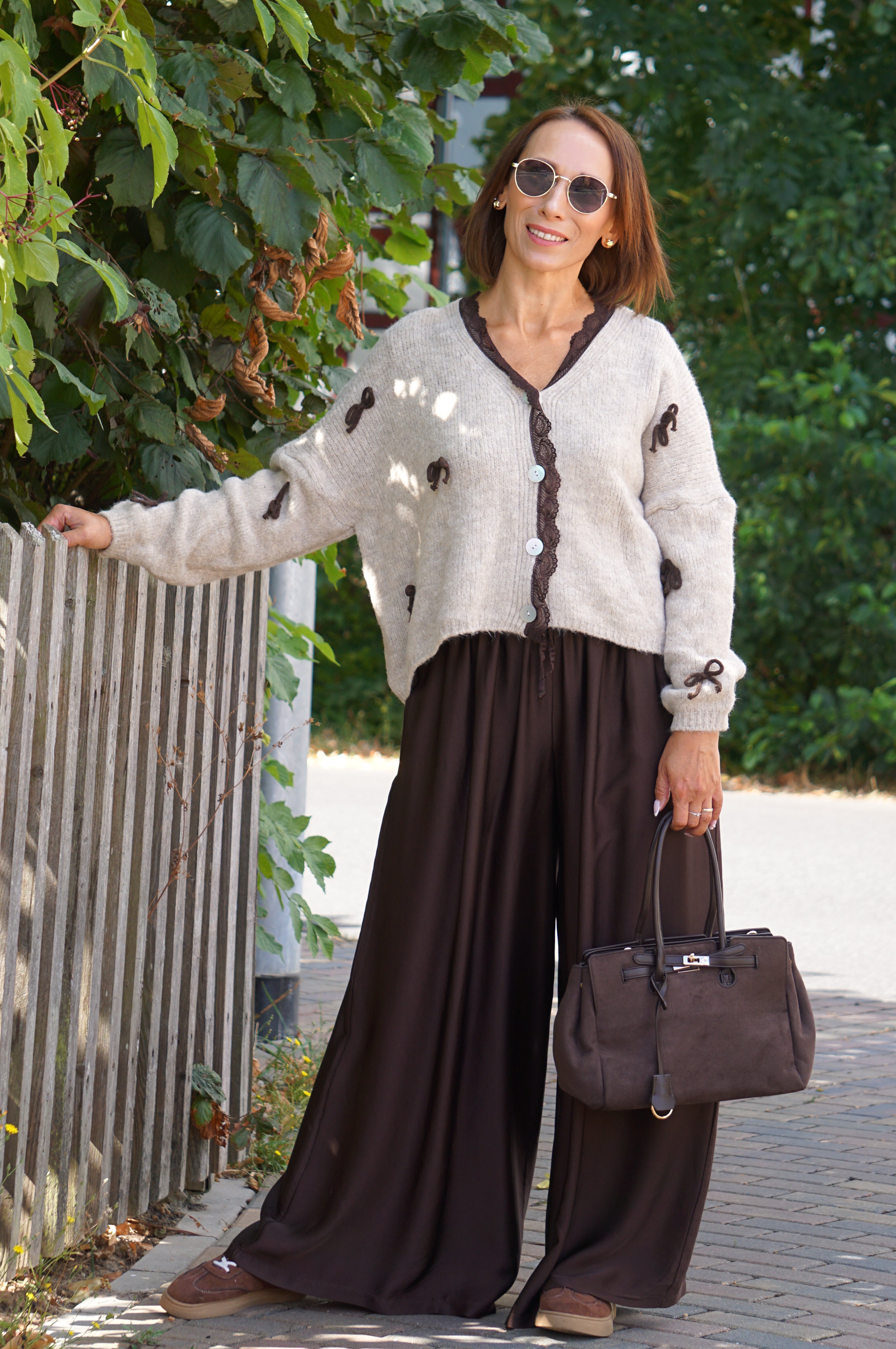 Strickjacke mit Schleifen, beige