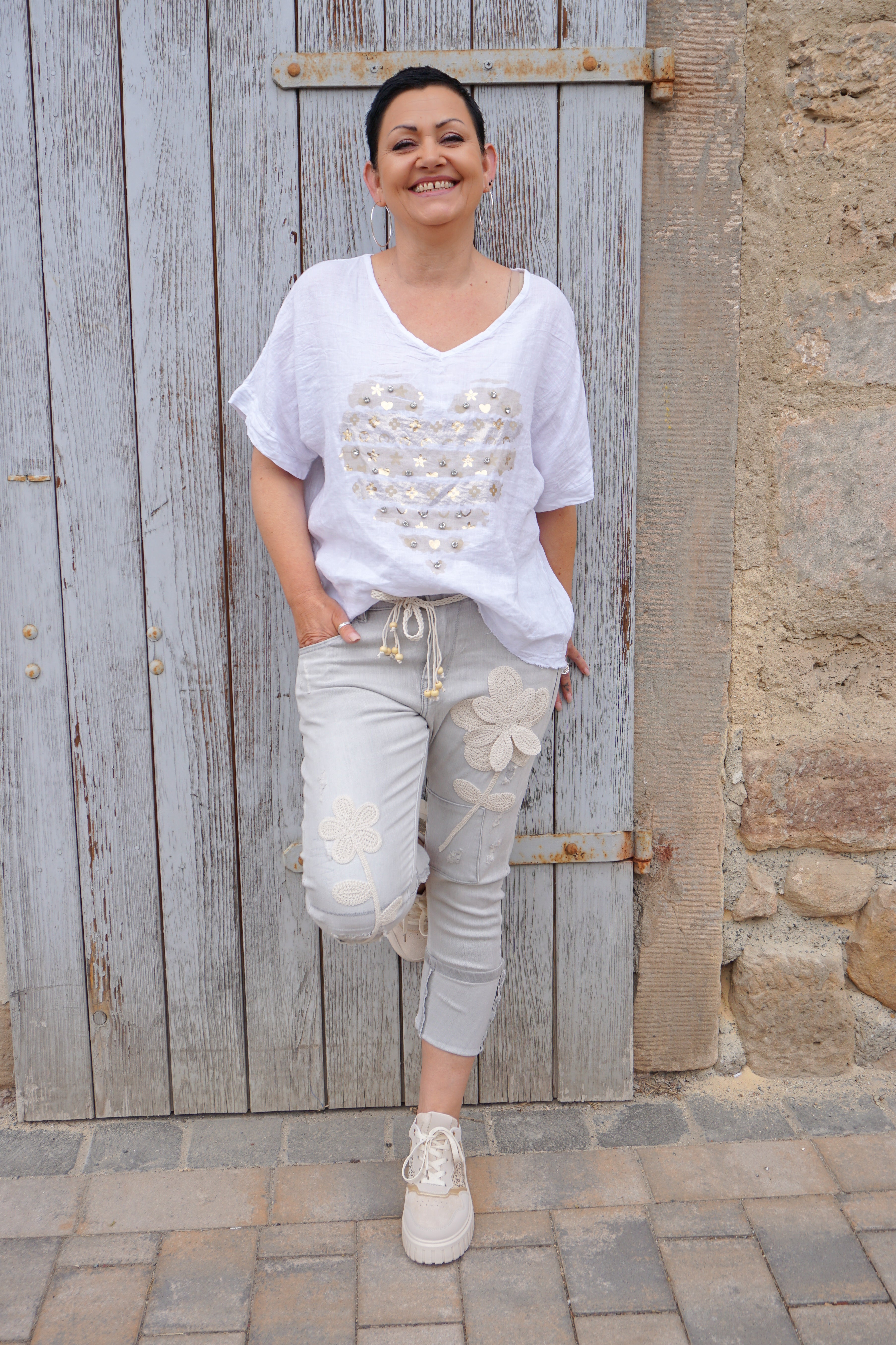 Sexy Woman Jeans mit gehäkelten Blumen